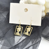 Golden Portrait Embossed Earrings