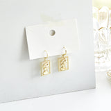 Golden Portrait Embossed Earrings