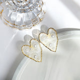 Transparent Heart-Shaped Earrings with Golden Edging